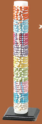 Cotton cord bracelets in wooden displays and carton tube. Fashion jewelry wholesale Bali Indonesia